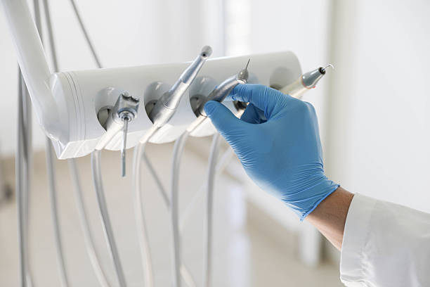 Professional Tooth Extraction technician working in North Lewisburg, OH